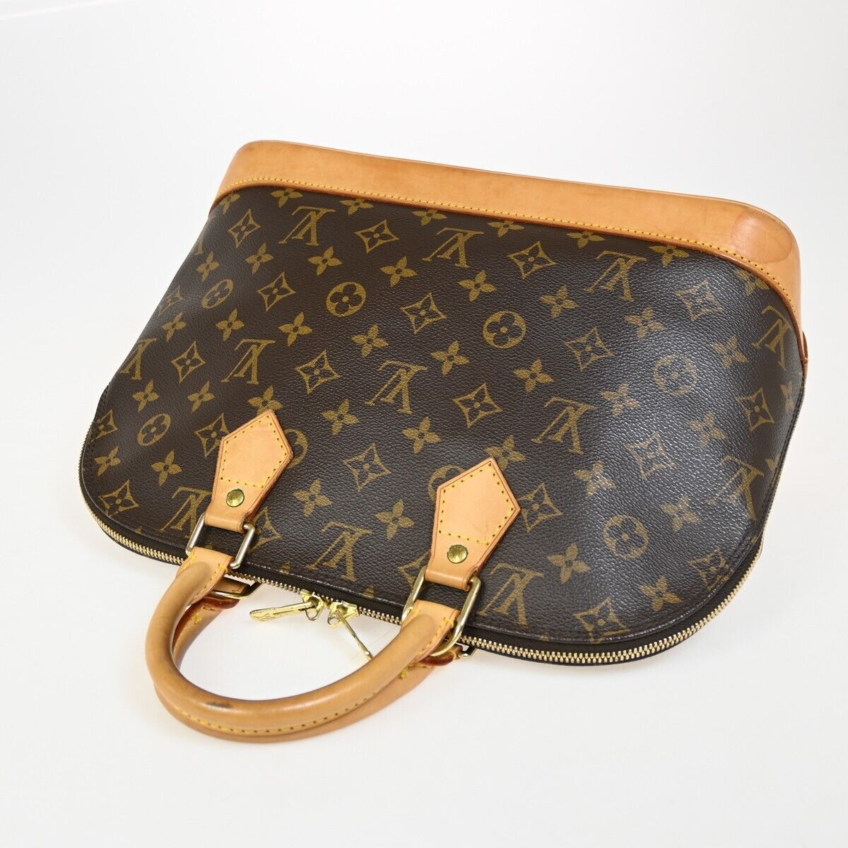 Louis Vuitton Alma Brown Canvas Hand Bag