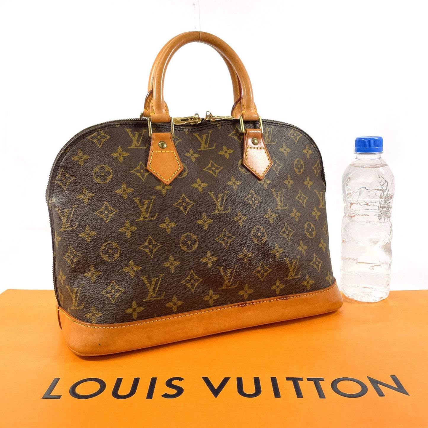 Louis Vuitton Alma Brown Canvas Hand Bag