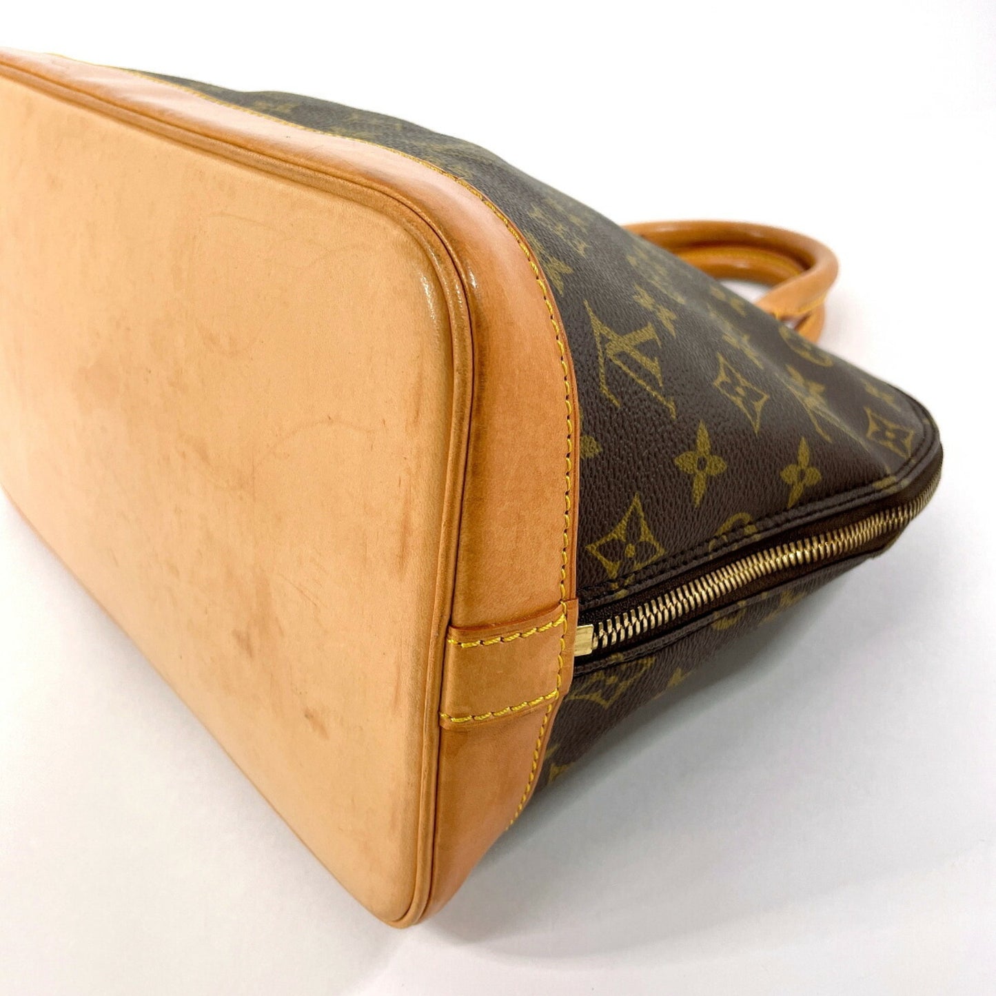 Louis Vuitton Alma Brown Canvas Hand Bag