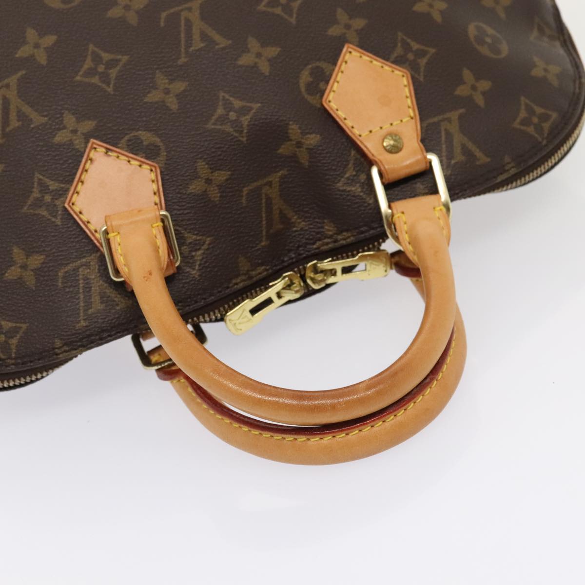 Louis Vuitton Alma Brown Canvas Hand Bag