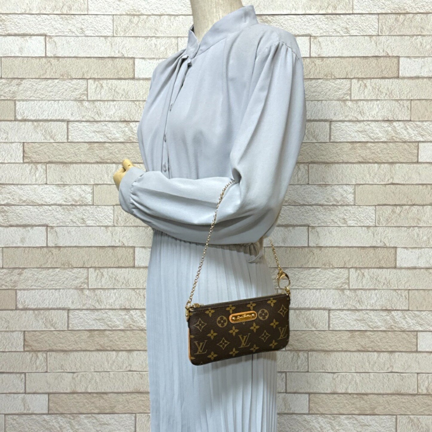 Louis Vuitton Mira Brown Canvas Clutch Bag