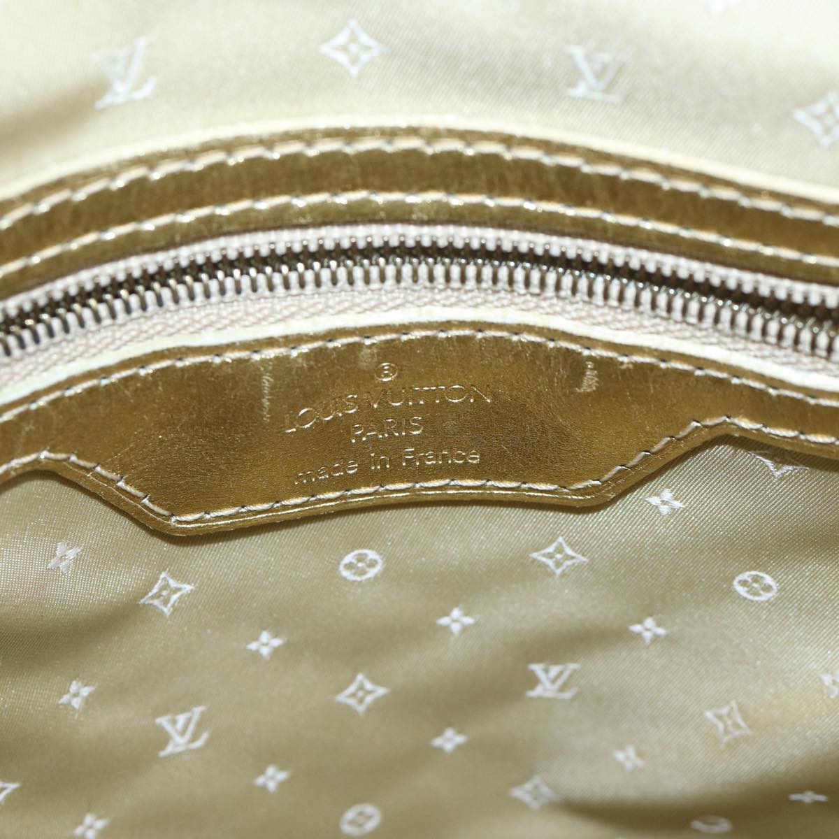 Louis Vuitton Lockit Gold Leather Hand Bag