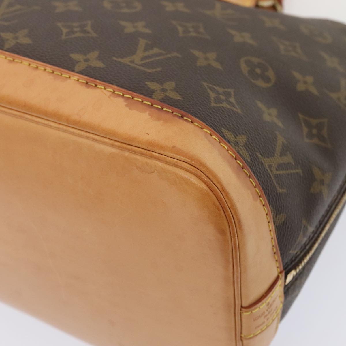 Louis Vuitton Alma Brown Canvas Hand Bag