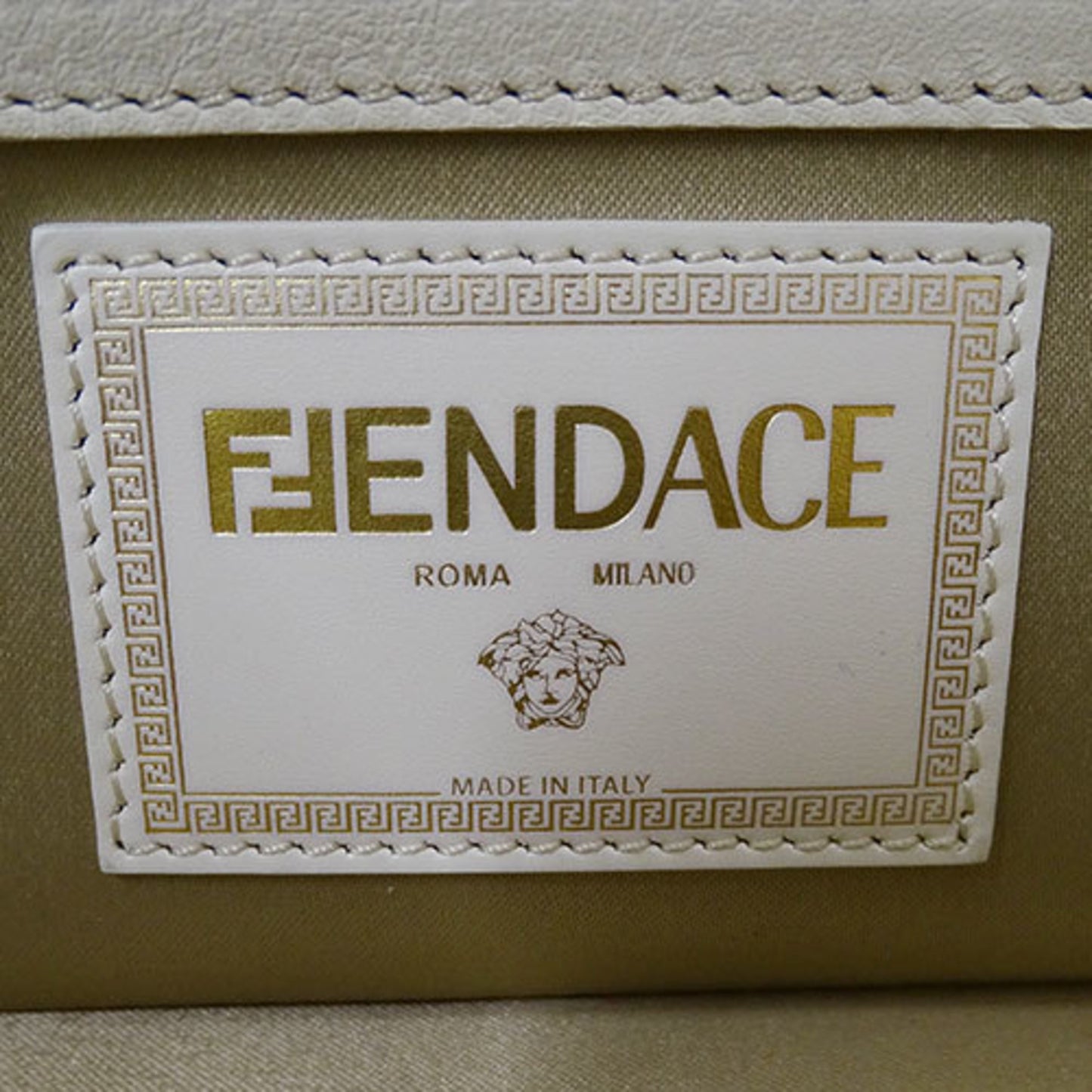 Fendi Baguette Gold Synthetic Hand Bag