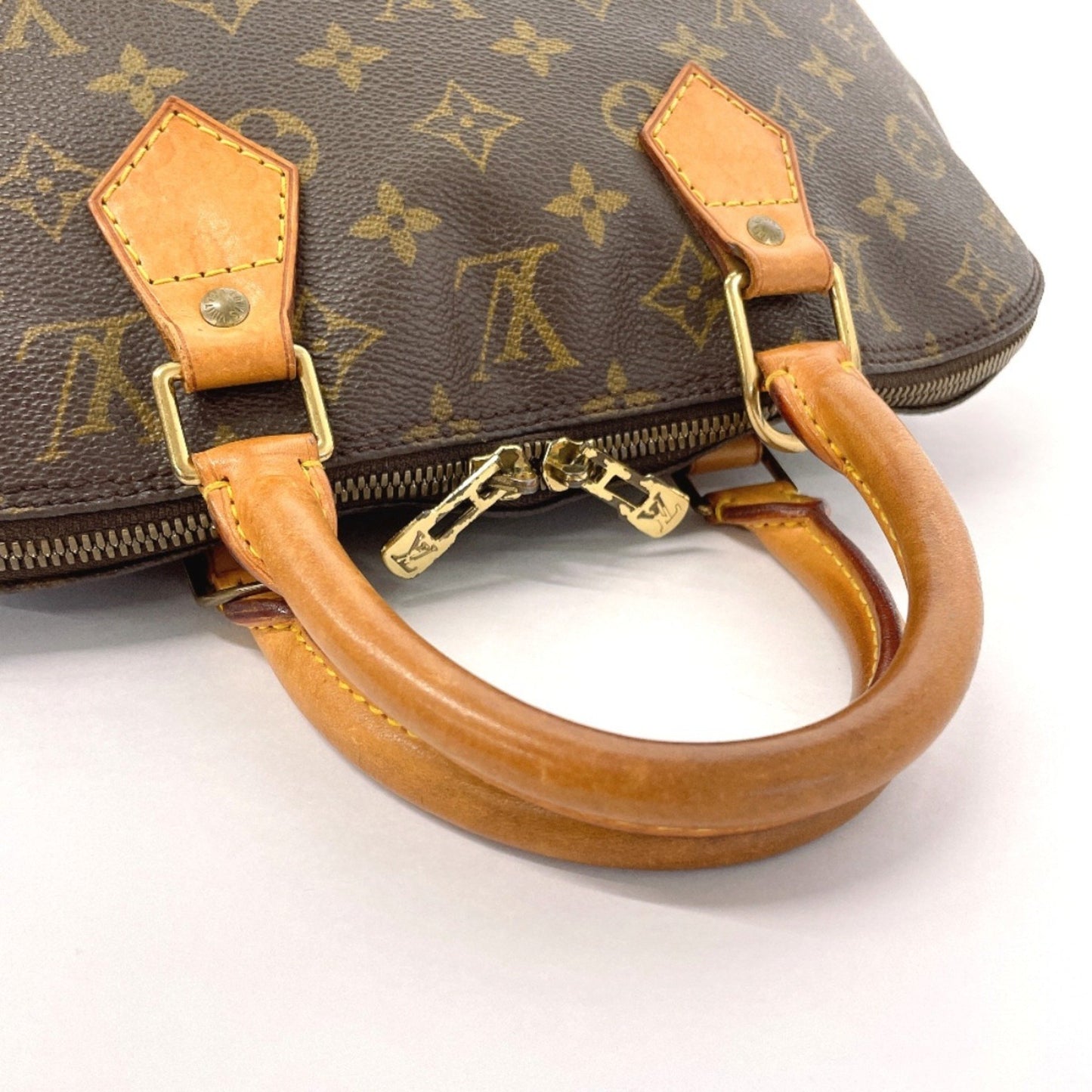 Louis Vuitton Alma Brown Canvas Hand Bag