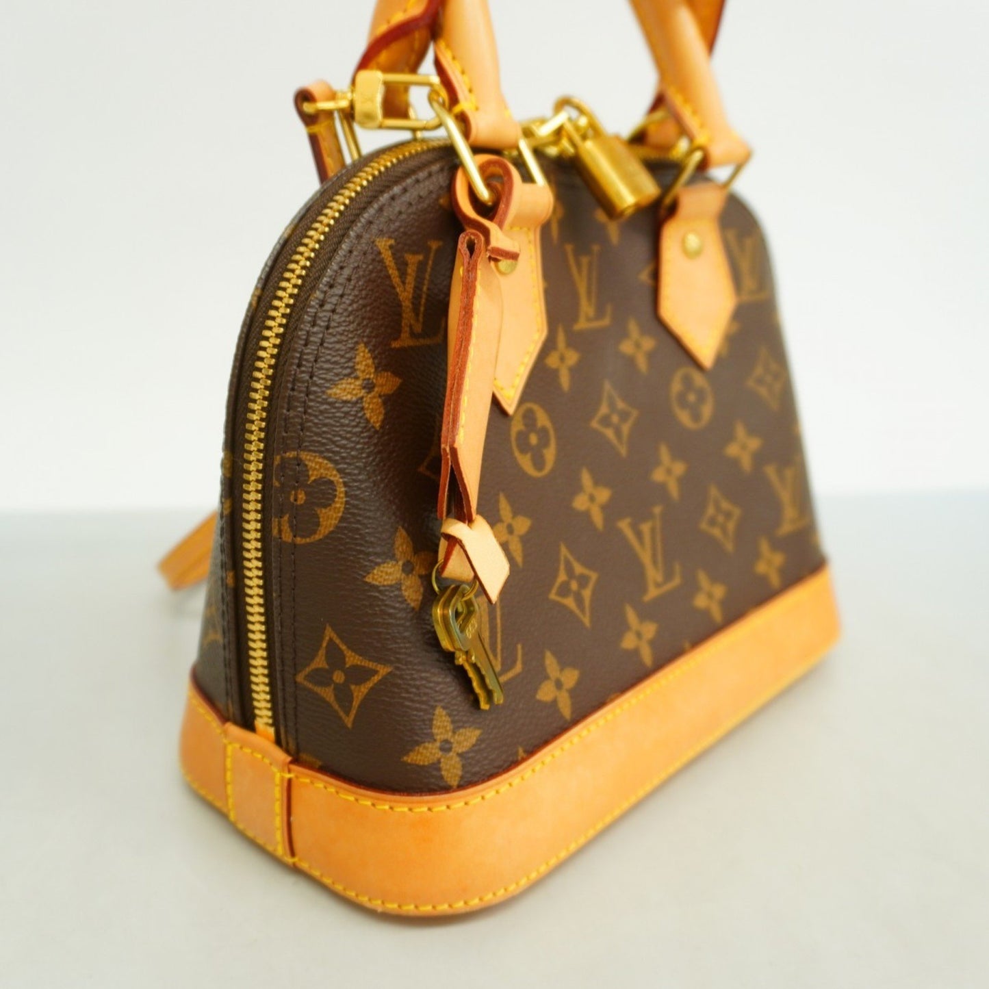 Louis Vuitton Alma BB Brown Canvas Hand Bag