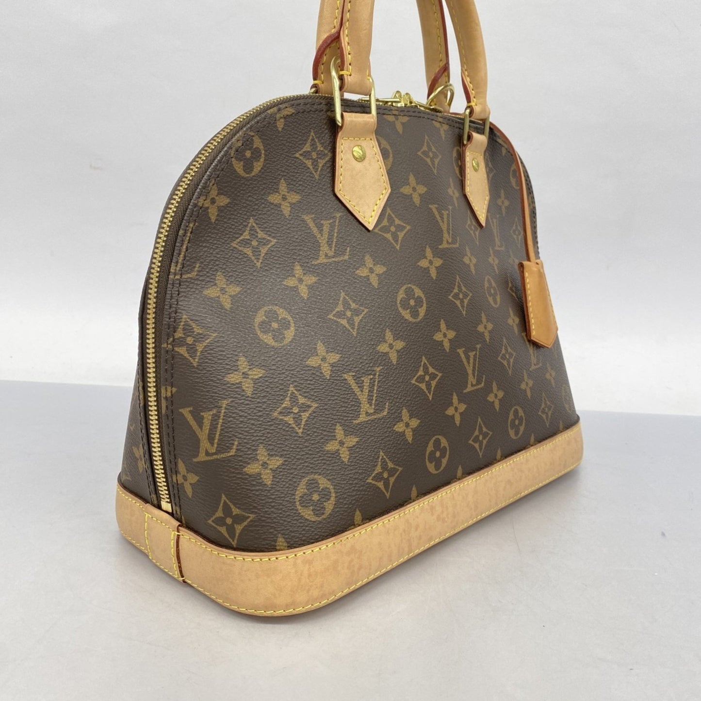 Louis Vuitton Alma Brown Canvas Hand Bag