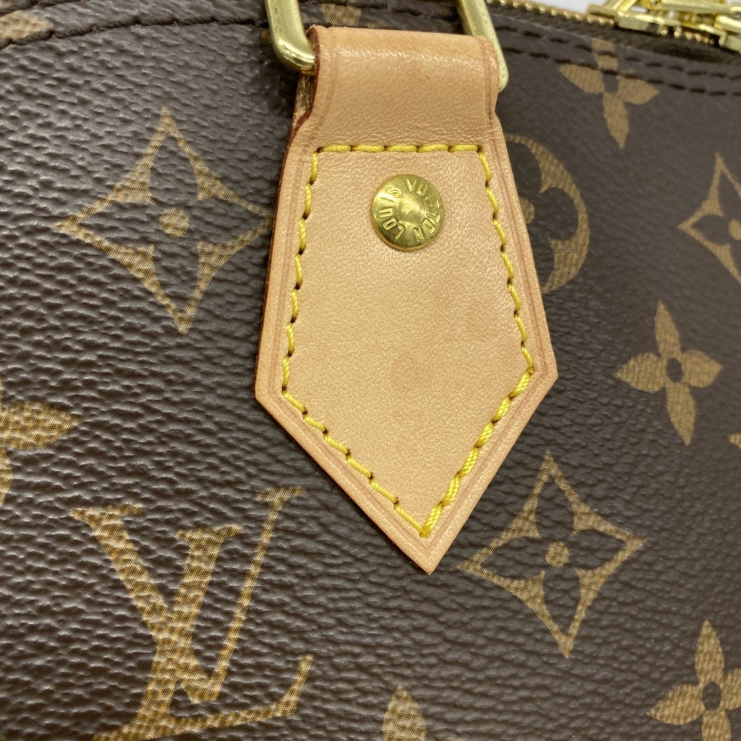 Louis Vuitton Alma Brown Canvas Hand Bag