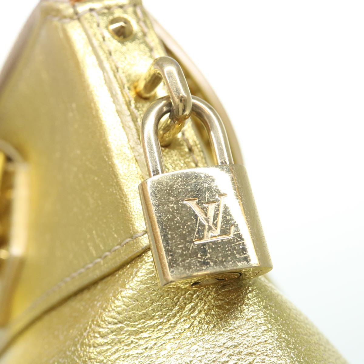 Louis Vuitton Lockit Gold Leather Hand Bag