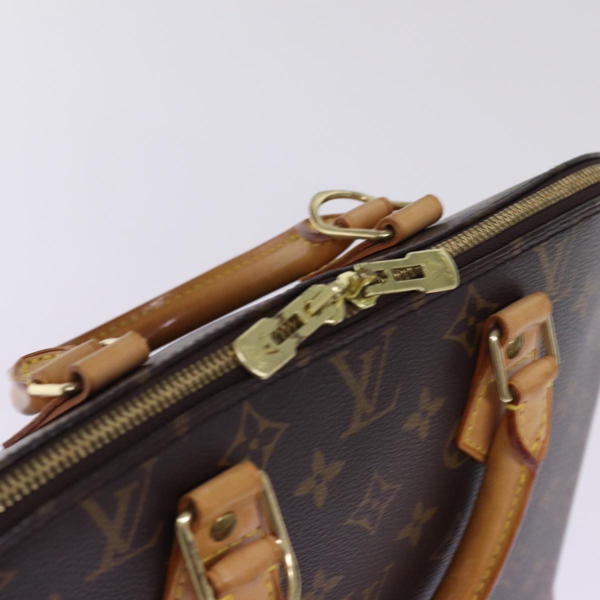 Louis Vuitton Alma Brown Canvas Hand Bag