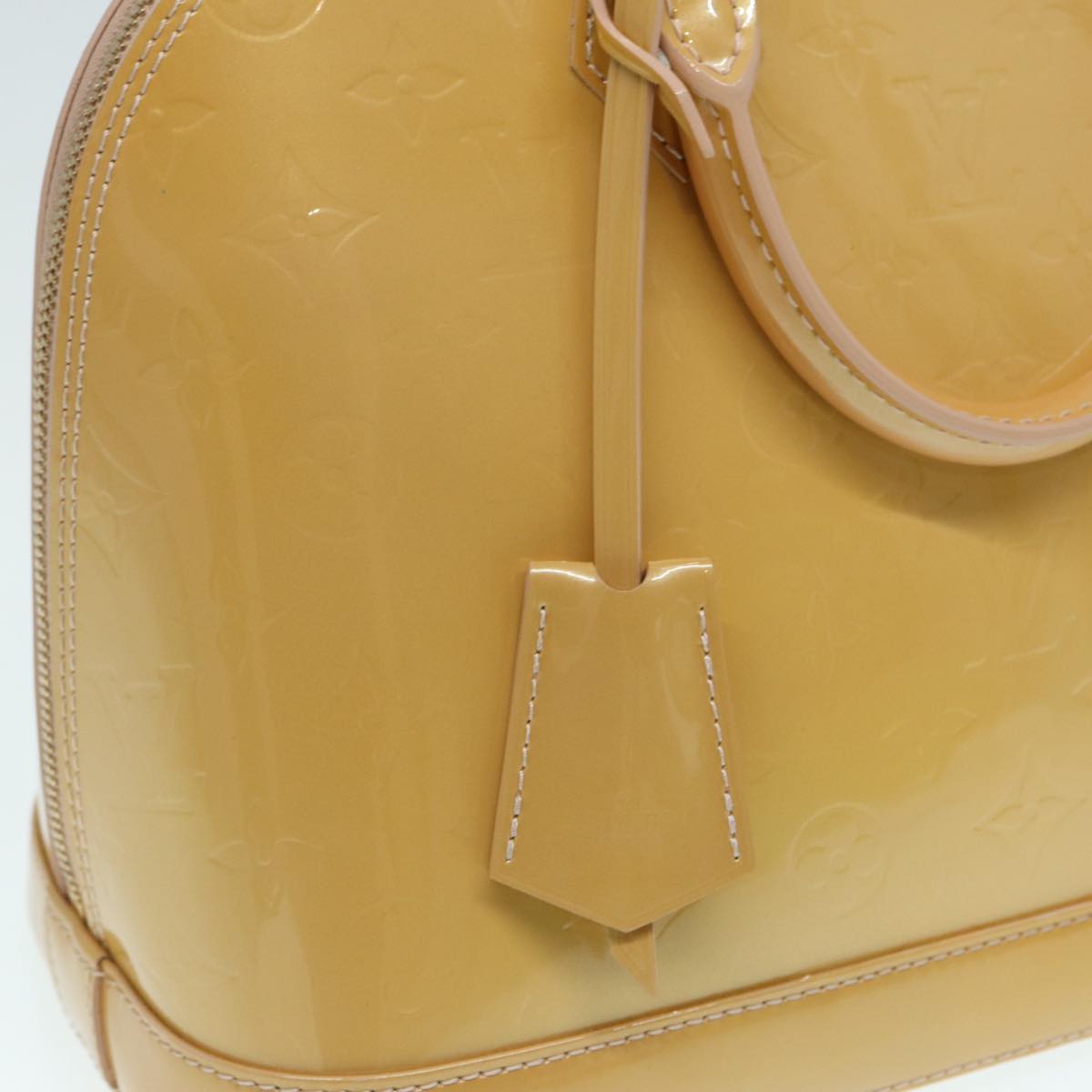 Louis Vuitton Alma Beige Patent Leather Hand Bag