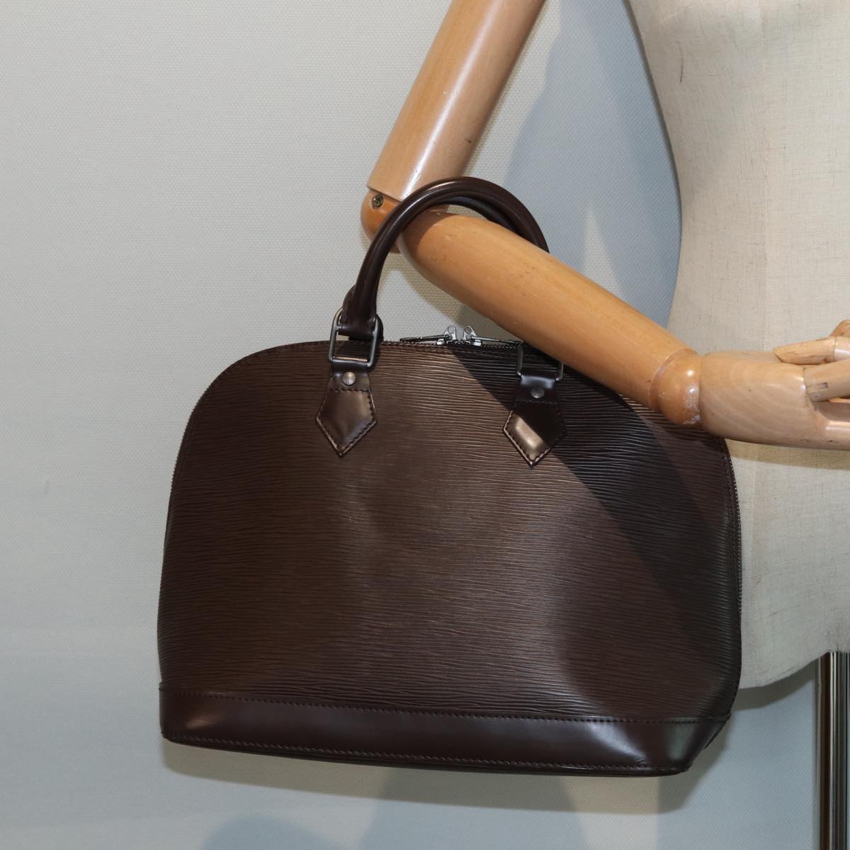 Louis Vuitton Alma Brown Leather Hand Bag