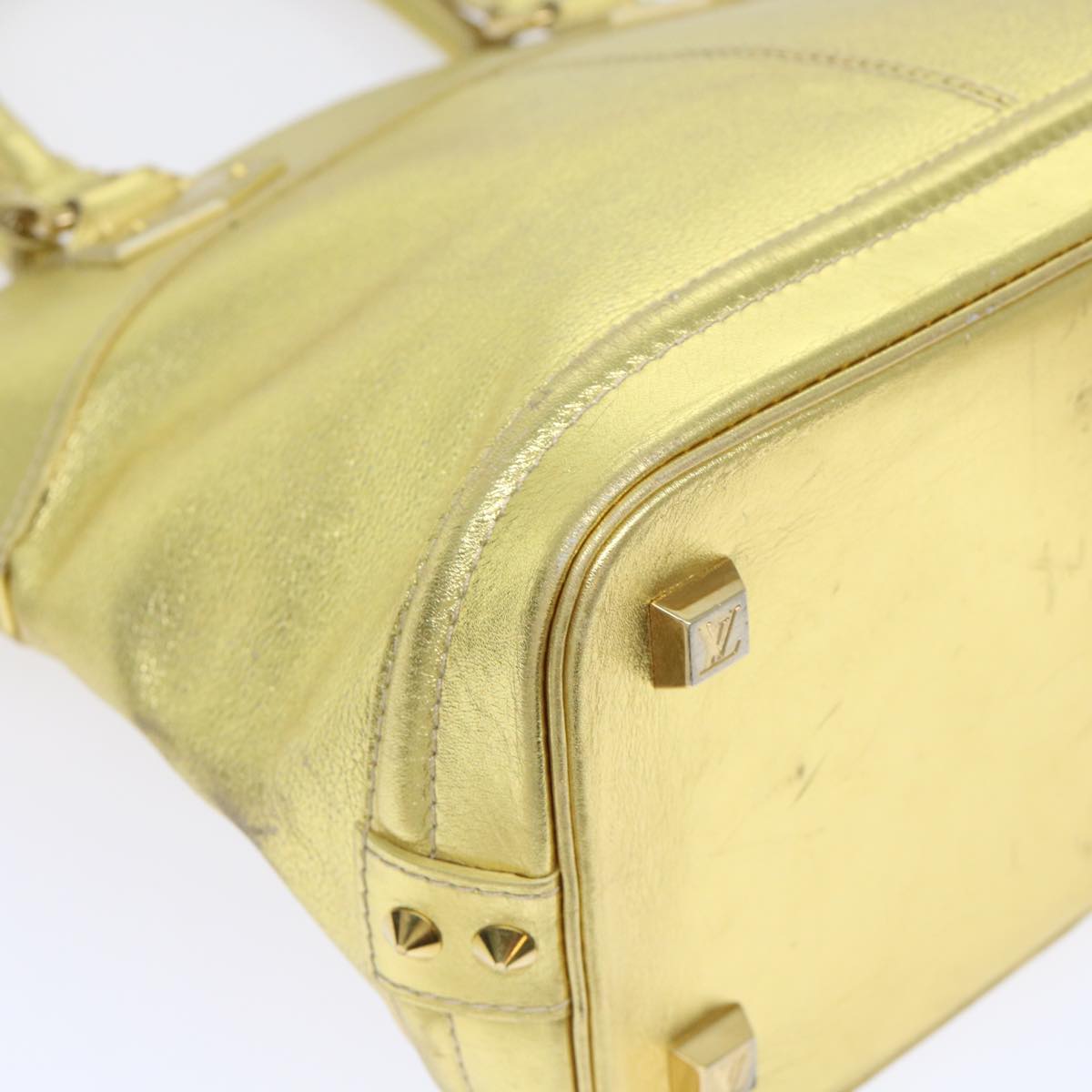 Louis Vuitton Lockit Gold Leather Hand Bag