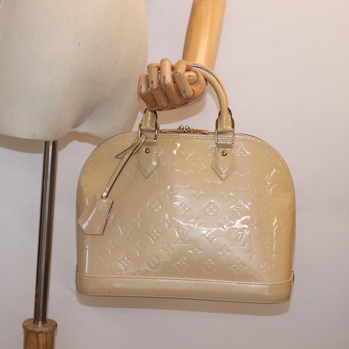 Louis Vuitton Alma Beige Patent Leather Hand Bag