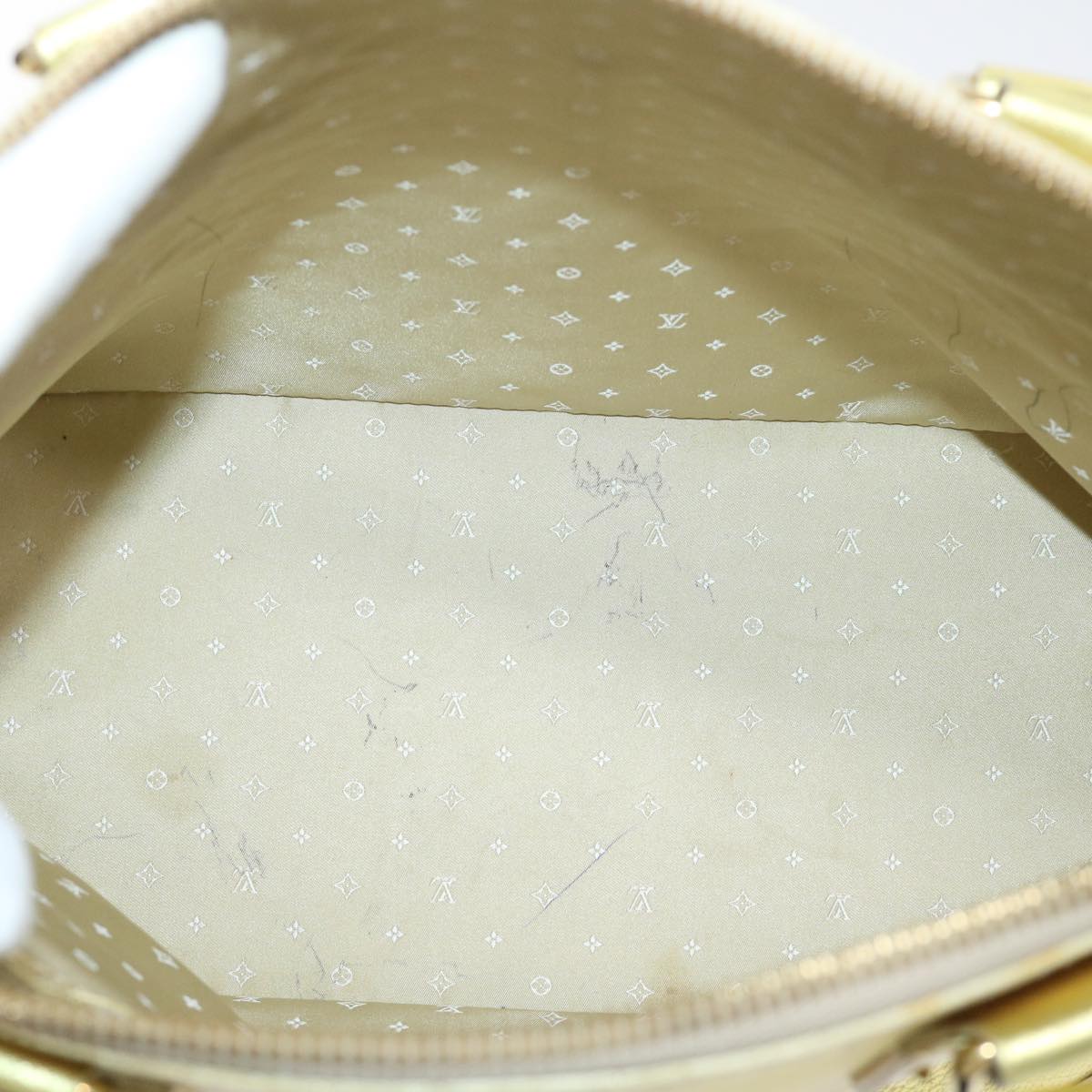 Louis Vuitton Lockit Gold Leather Hand Bag