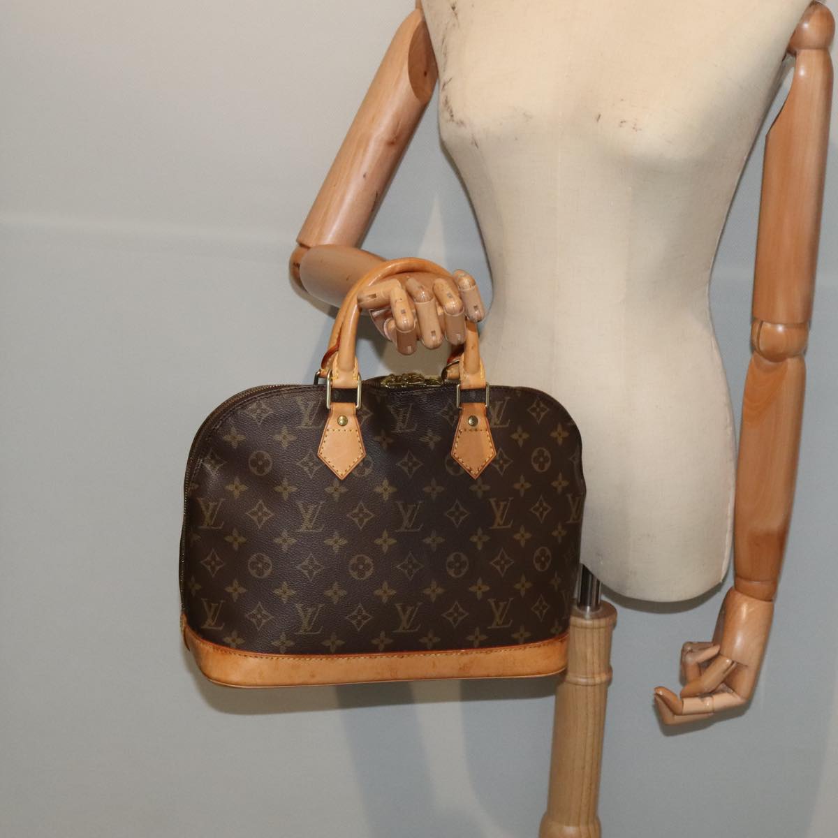 Louis Vuitton Alma Brown Canvas Hand Bag