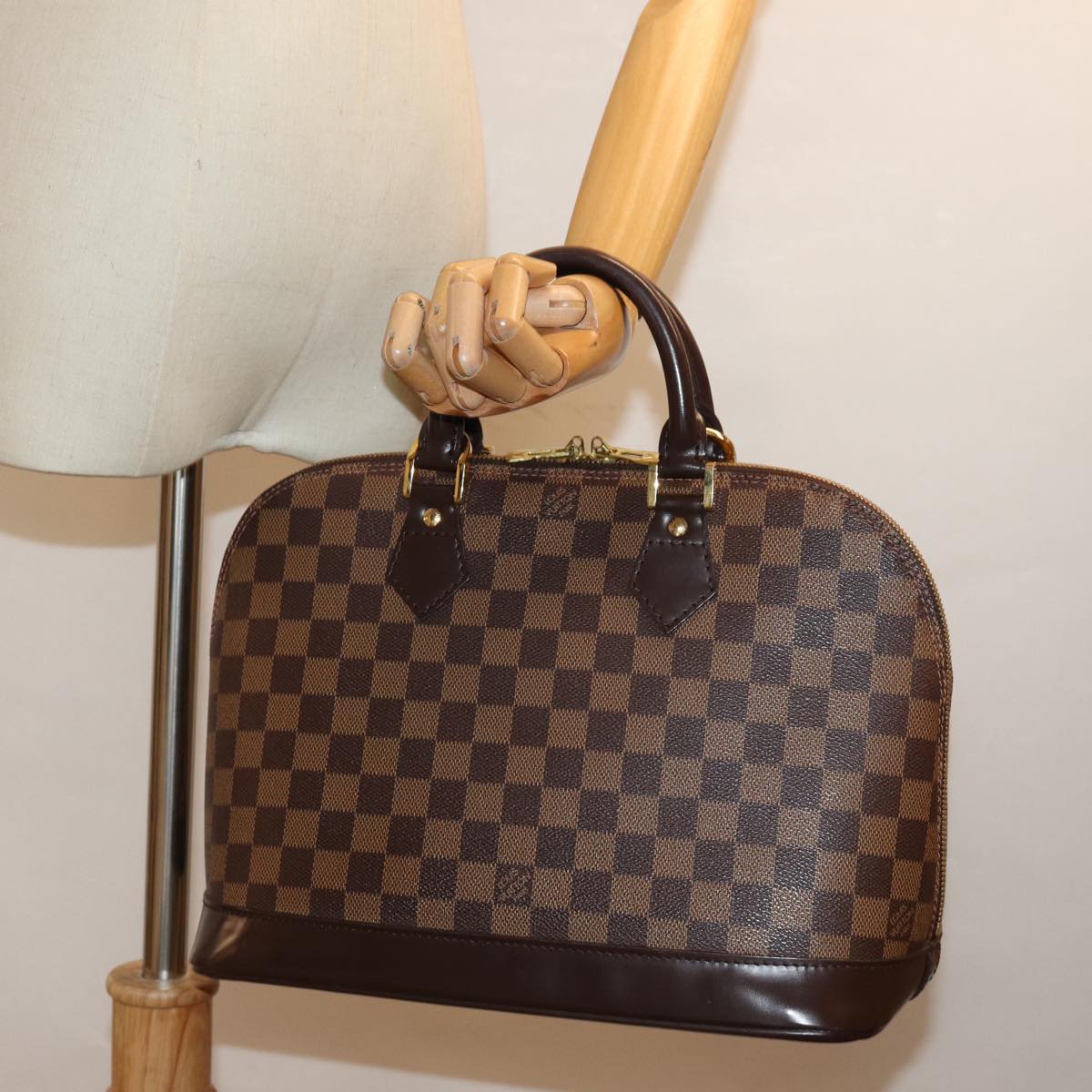 Louis Vuitton Alma Brown Canvas Hand Bag