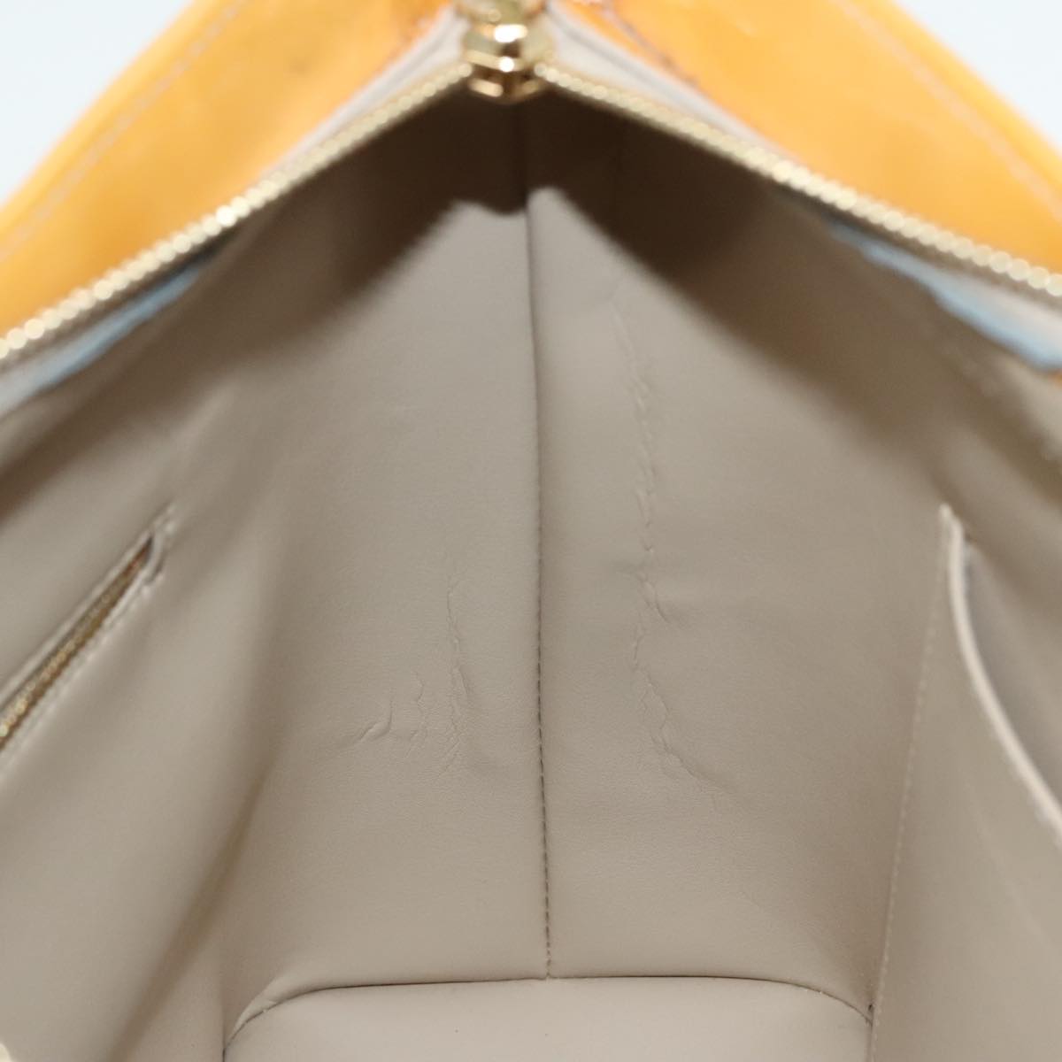 Louis Vuitton Houston Beige Patent Leather Hand Bag