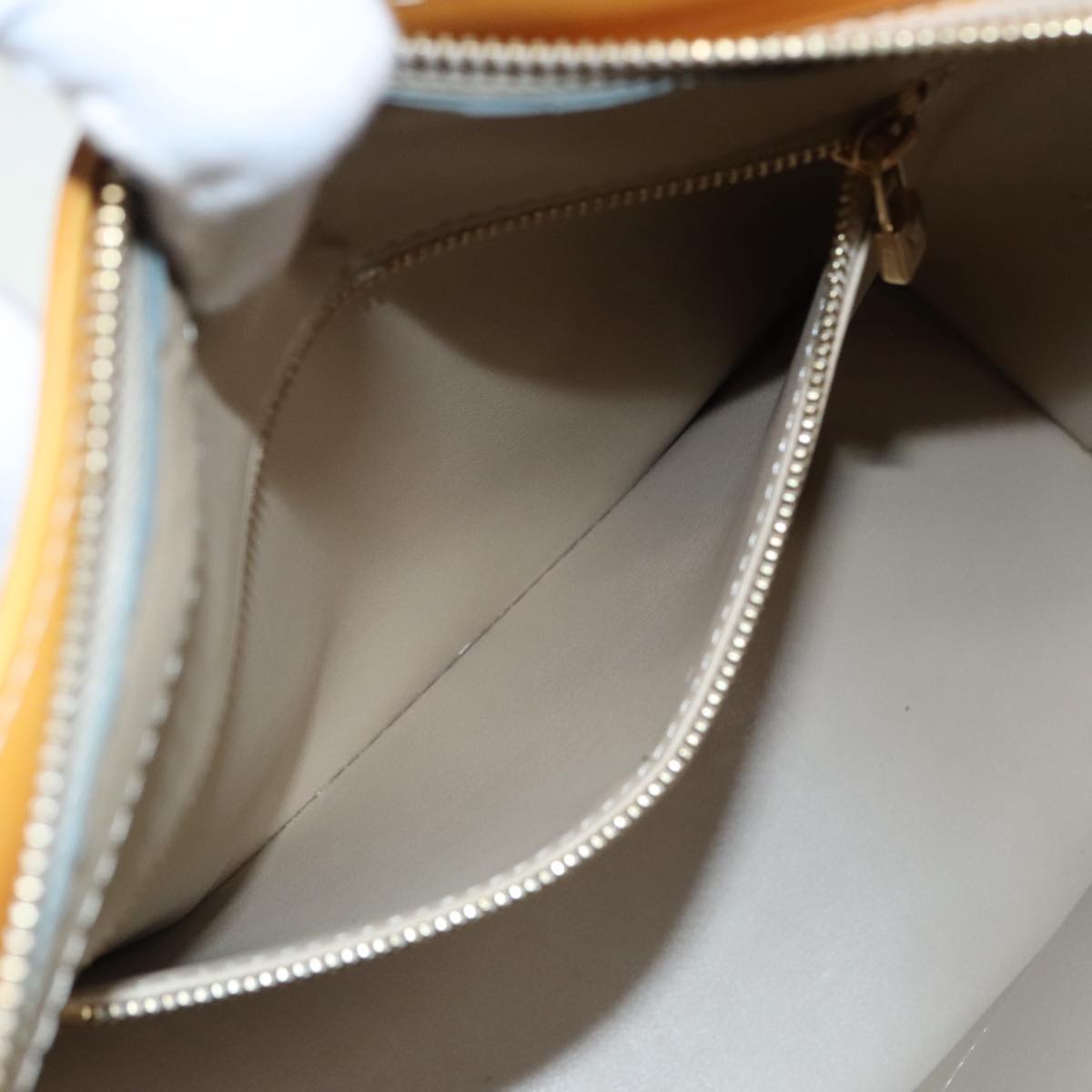 Louis Vuitton Houston Beige Patent Leather Hand Bag