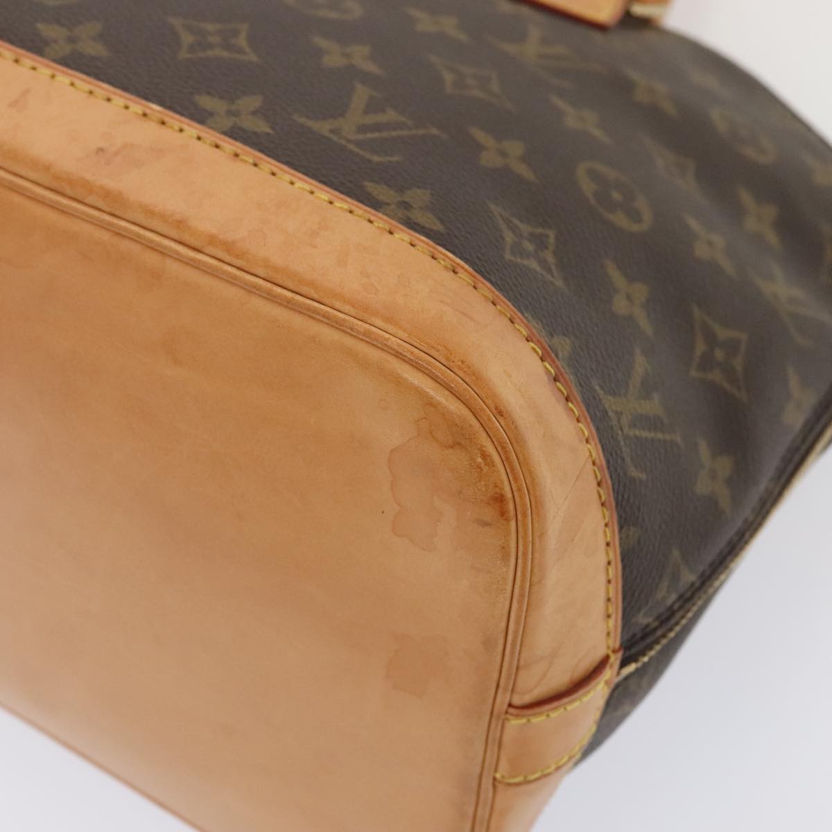 Louis Vuitton Alma Brown Canvas Hand Bag