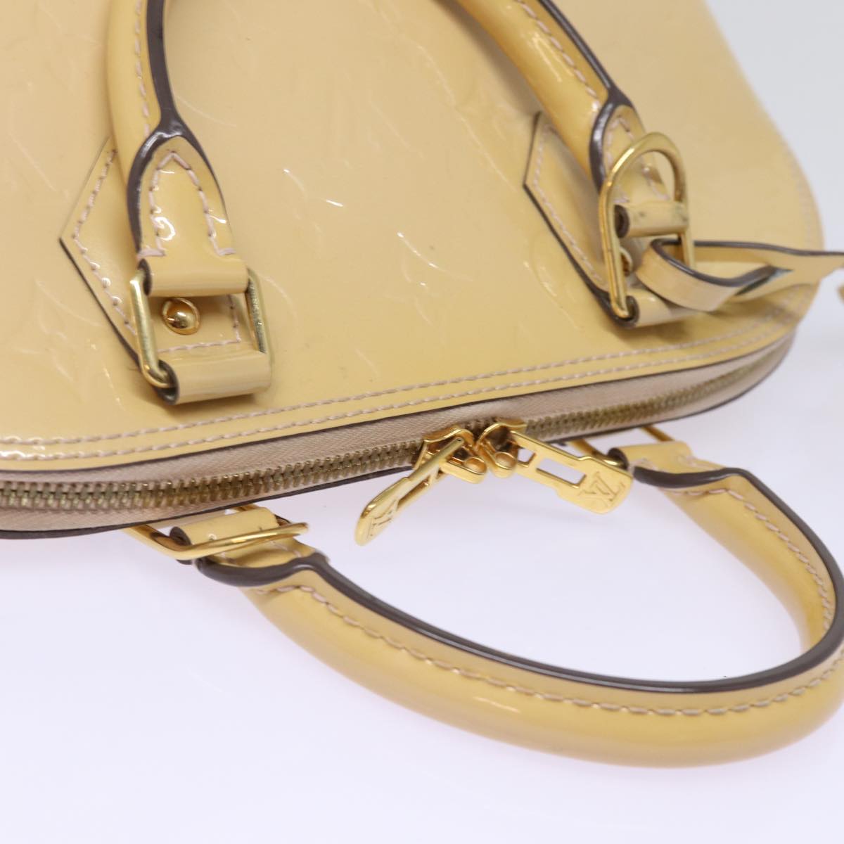 Louis Vuitton Alma Beige Patent Leather Hand Bag