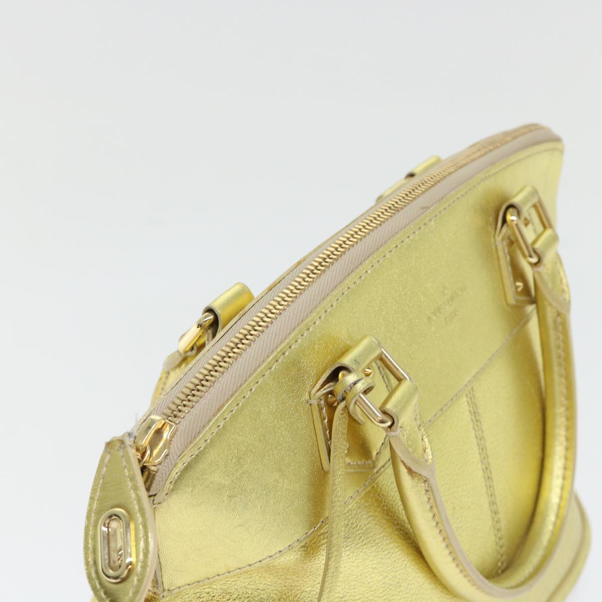 Louis Vuitton Lockit Gold Leather Hand Bag