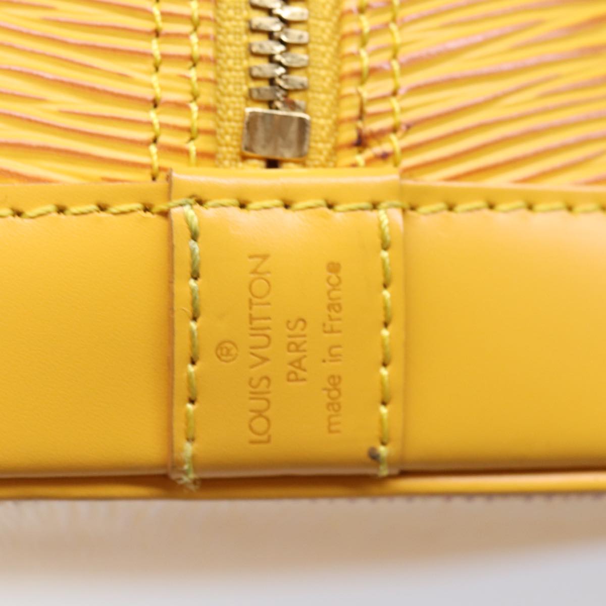 Louis Vuitton Alma Yellow Leather Hand Bag