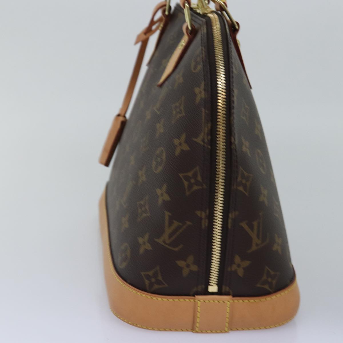 Louis Vuitton Alma Brown Canvas Hand Bag