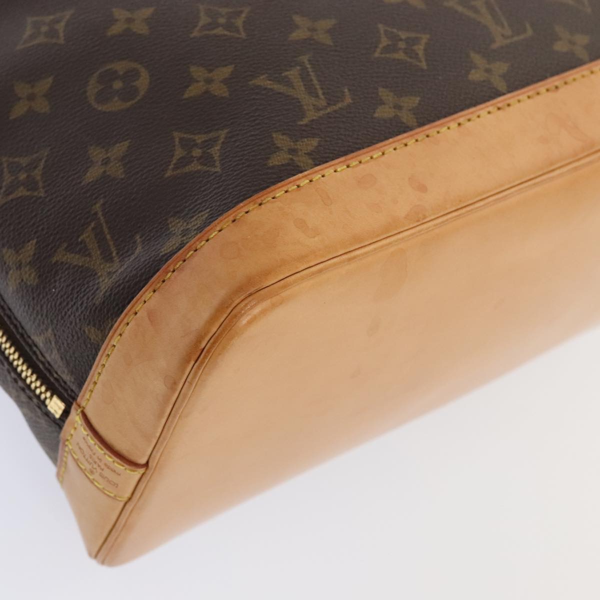 Louis Vuitton Alma Brown Canvas Hand Bag