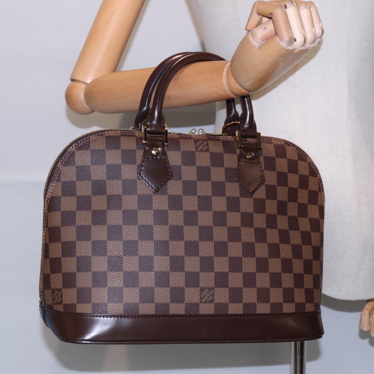 Louis Vuitton Alma Brown Canvas Hand Bag