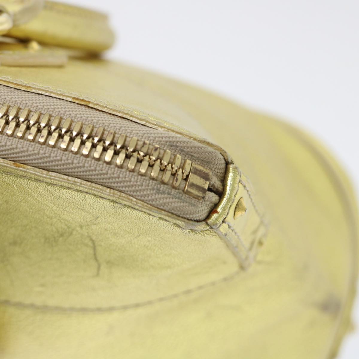 Louis Vuitton Lockit Gold Leather Hand Bag