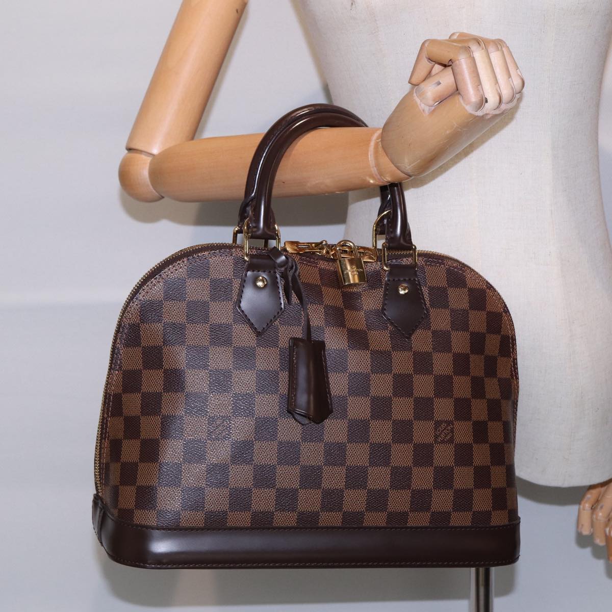 Louis Vuitton Alma Brown Canvas Hand Bag