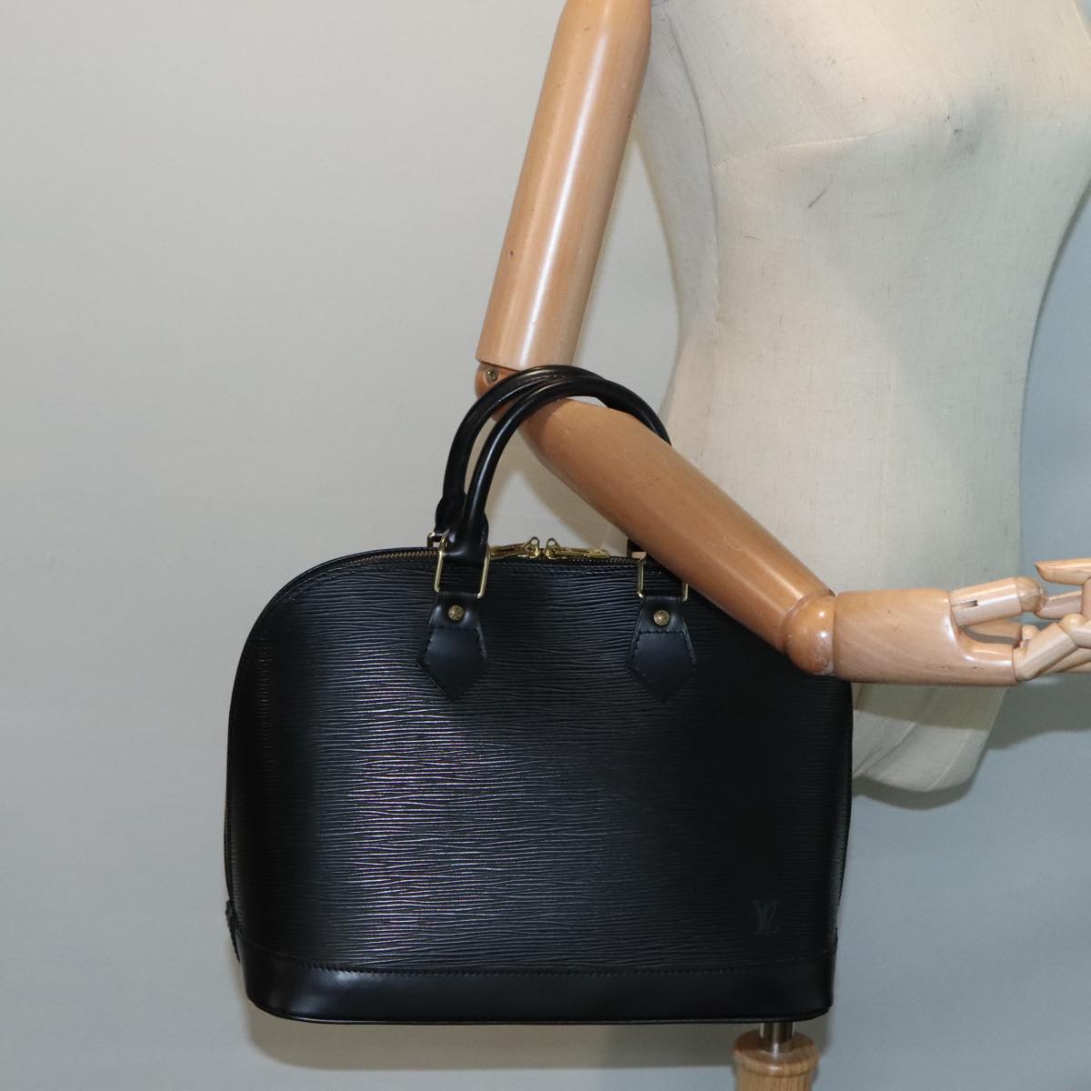 Louis Vuitton Alma Black Leather Hand Bag