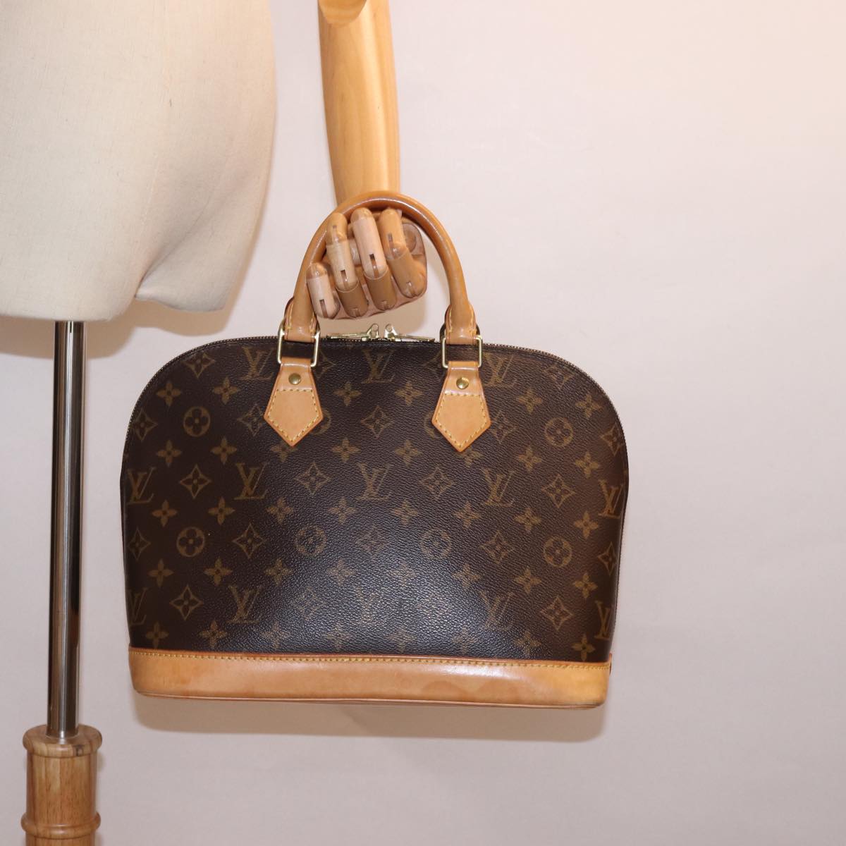 Louis Vuitton Alma Brown Canvas Hand Bag