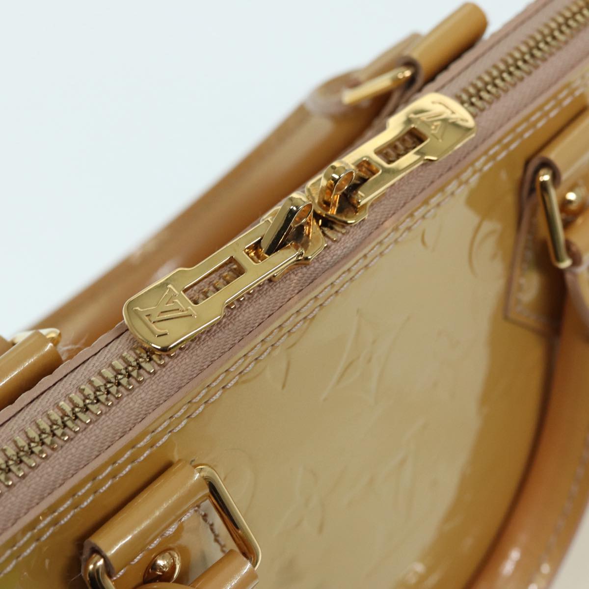 Louis Vuitton Alma Beige Patent Leather Hand Bag