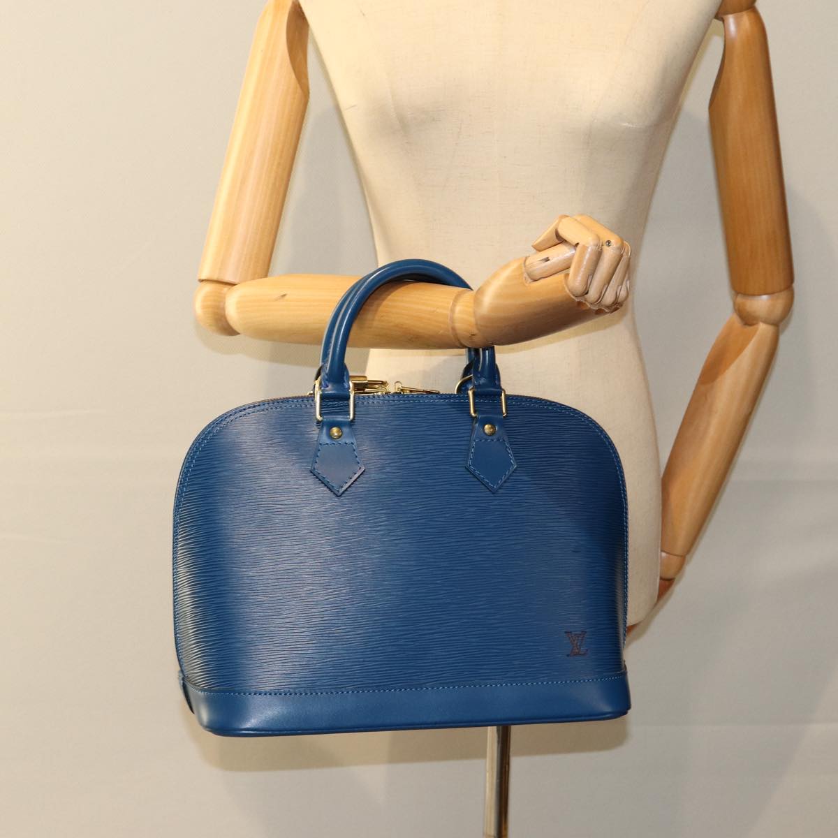 Louis Vuitton Alma Blue Leather Hand Bag