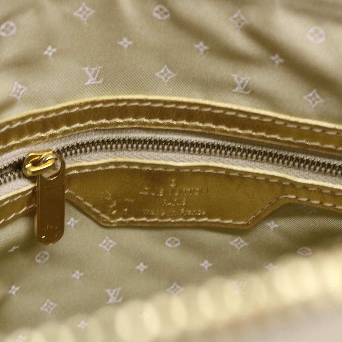 Louis Vuitton Lockit Gold Leather Hand Bag