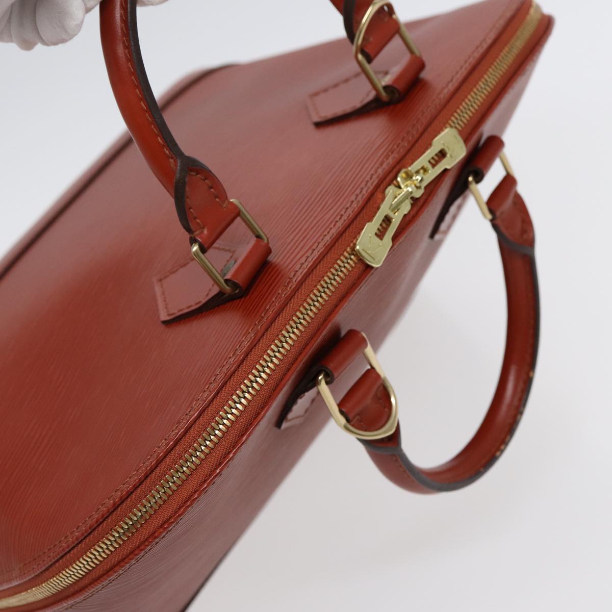 Louis Vuitton Alma Brown Leather Hand Bag