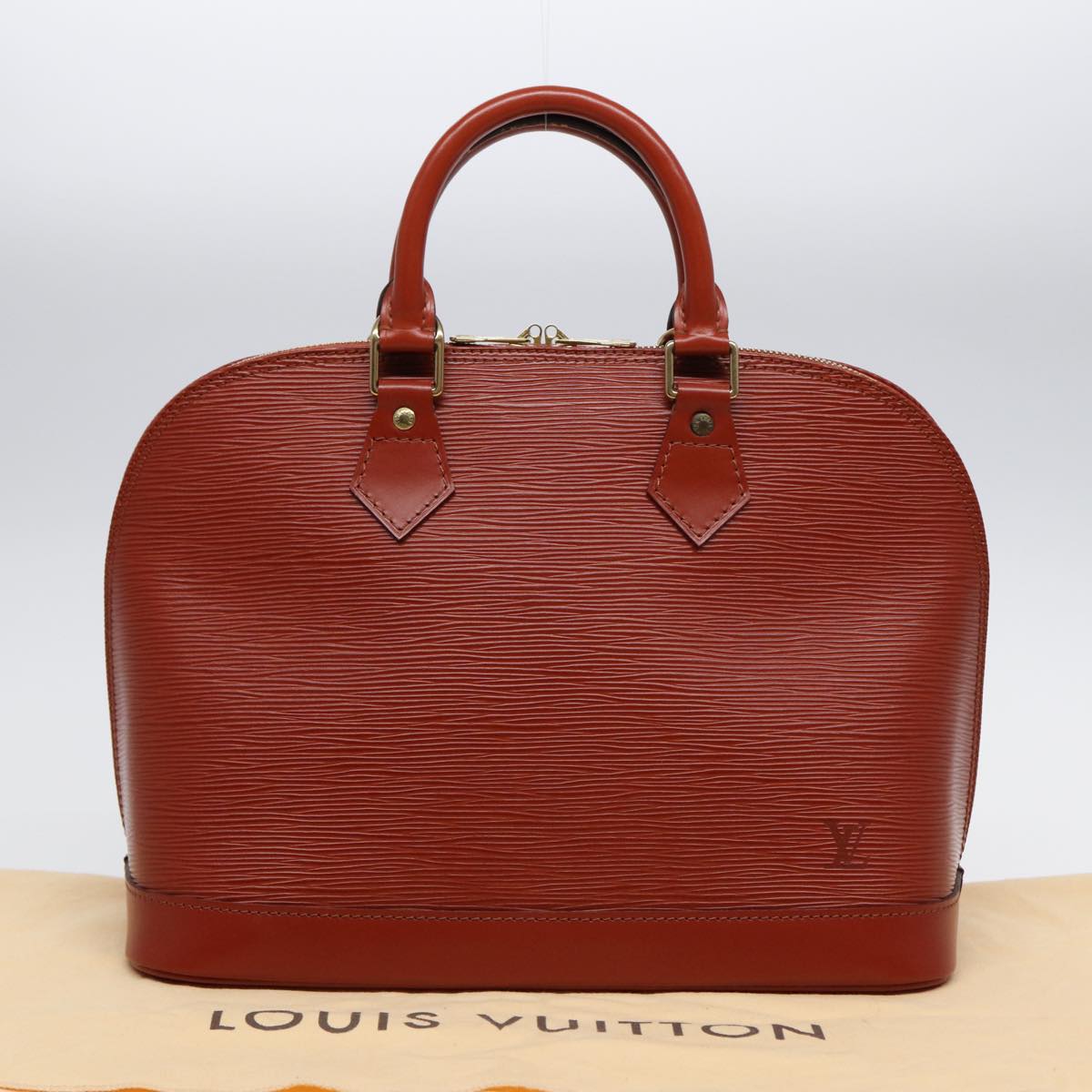 Louis Vuitton Alma Brown Leather Hand Bag