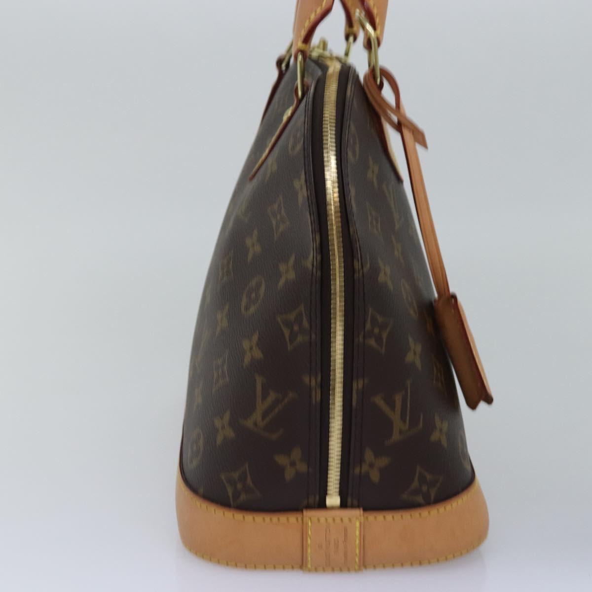 Louis Vuitton Alma Brown Canvas Hand Bag