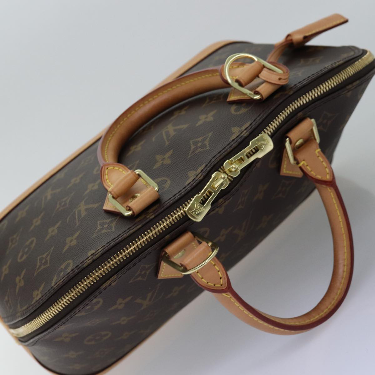 Louis Vuitton Alma Brown Canvas Hand Bag