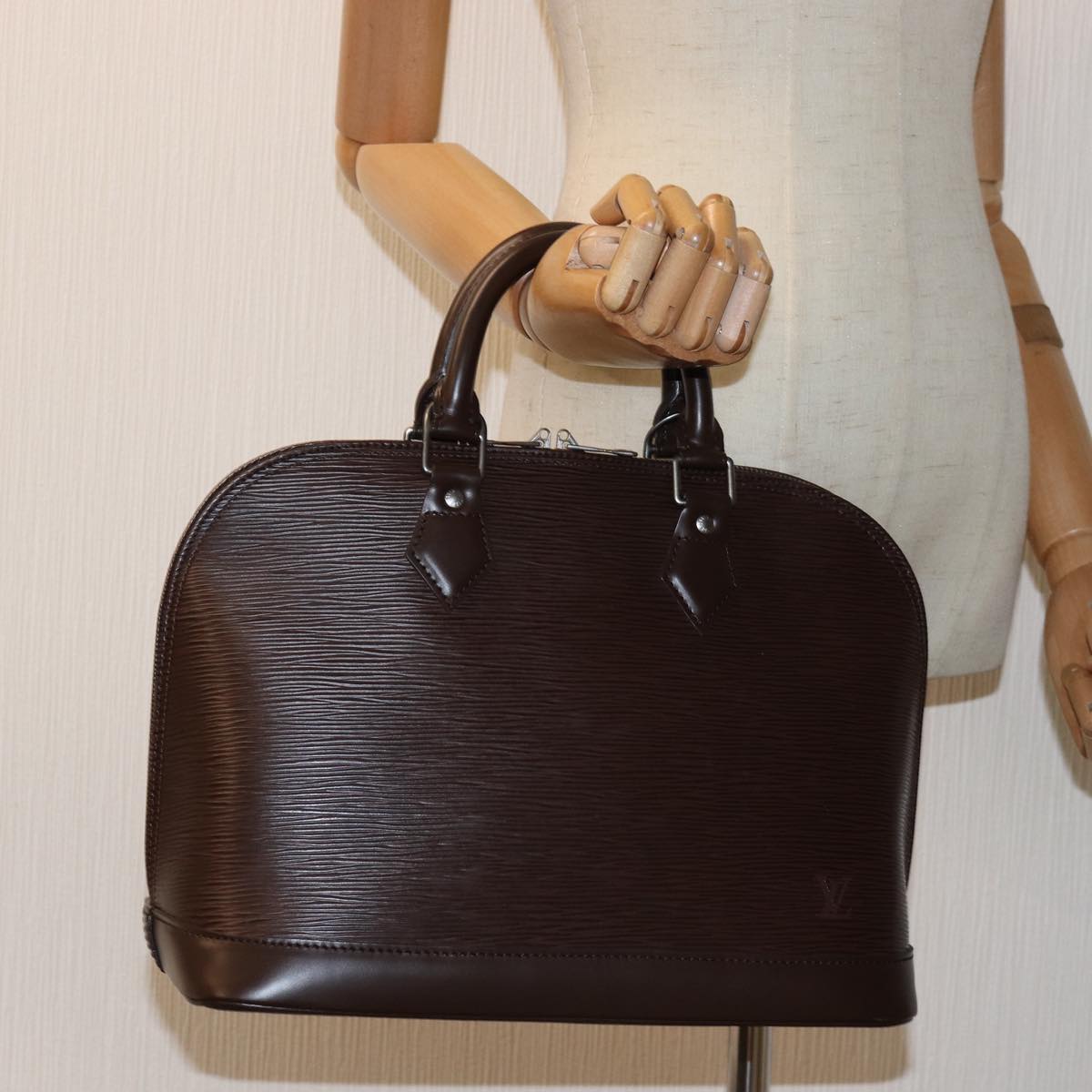 Louis Vuitton Alma Brown Leather Hand Bag