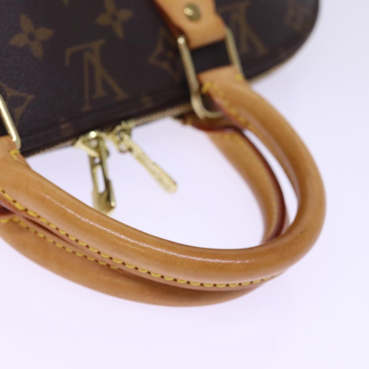 Louis Vuitton Alma Brown Canvas Hand Bag