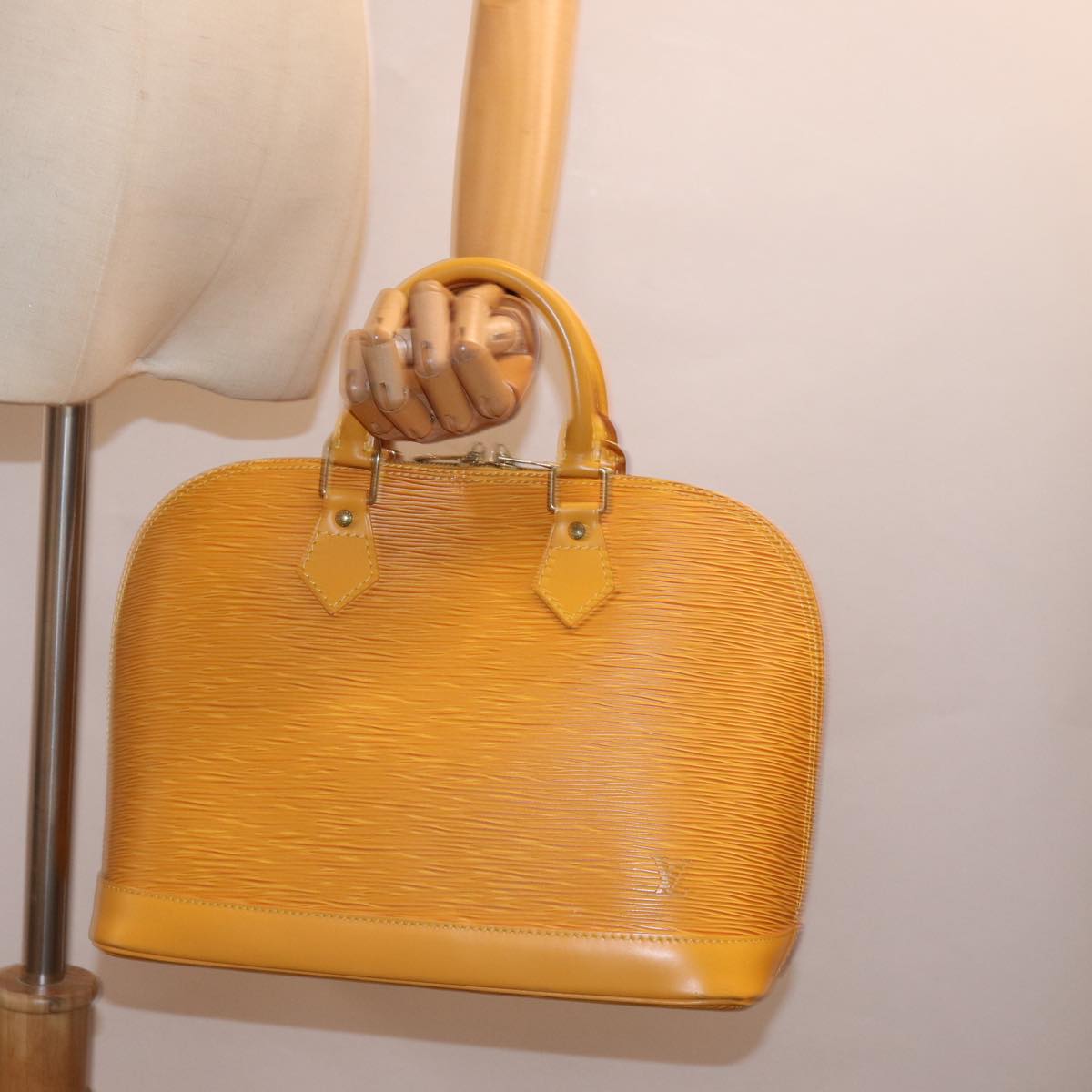 Louis Vuitton Alma Yellow Leather Hand Bag