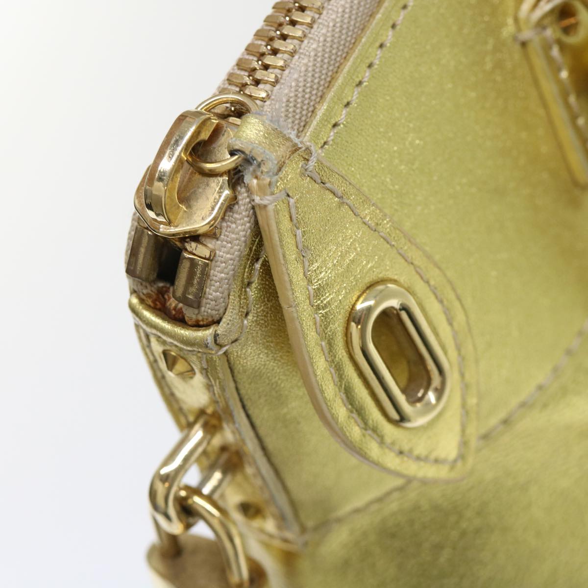 Louis Vuitton Lockit Gold Leather Hand Bag