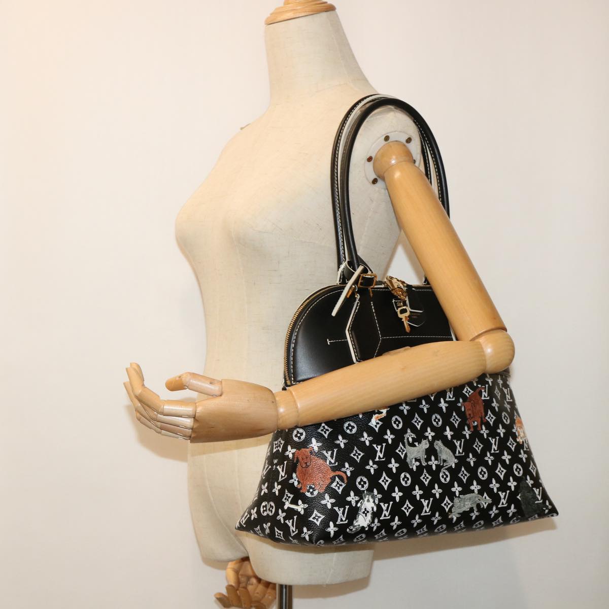 Louis Vuitton Alma Black Canvas Hand Bag