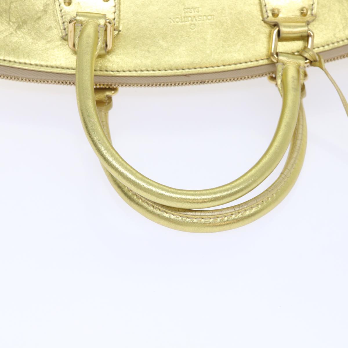 Louis Vuitton Lockit Gold Leather Hand Bag