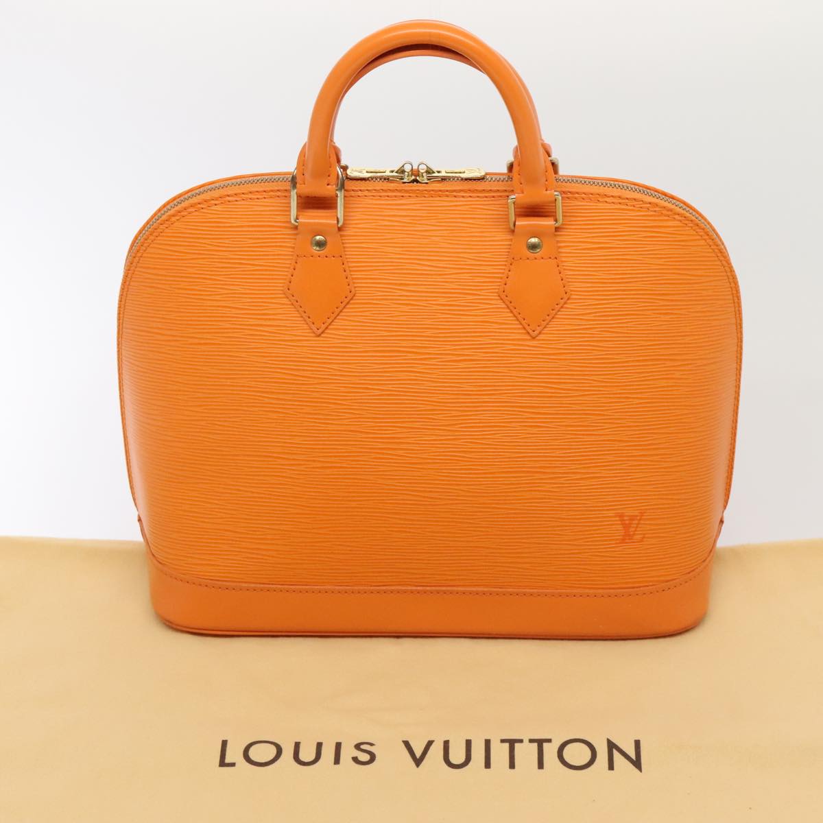 Louis Vuitton Alma Orange Leather Hand Bag