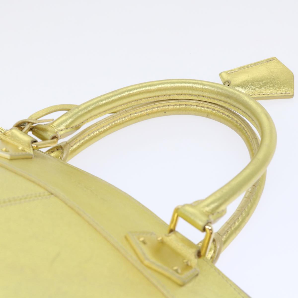 Louis Vuitton Lockit Gold Leather Hand Bag