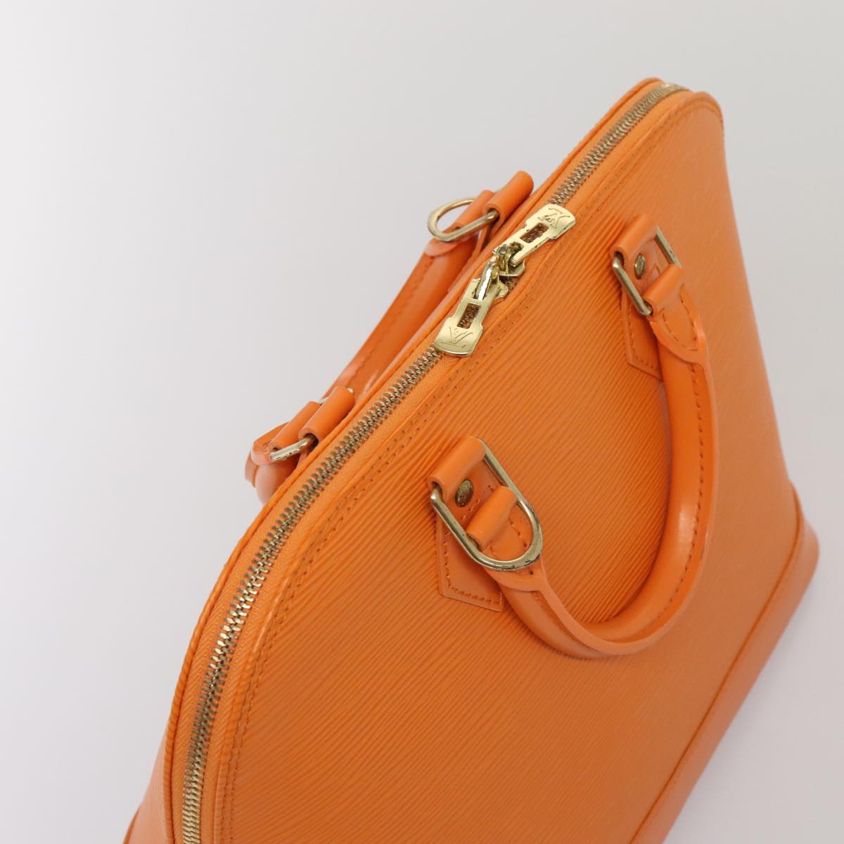 Louis Vuitton Alma Orange Leather Hand Bag